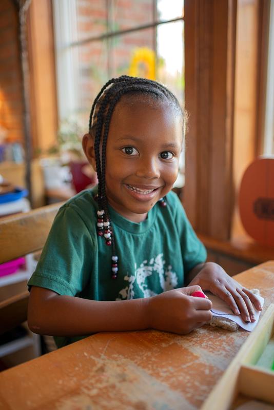 child in montessori school
