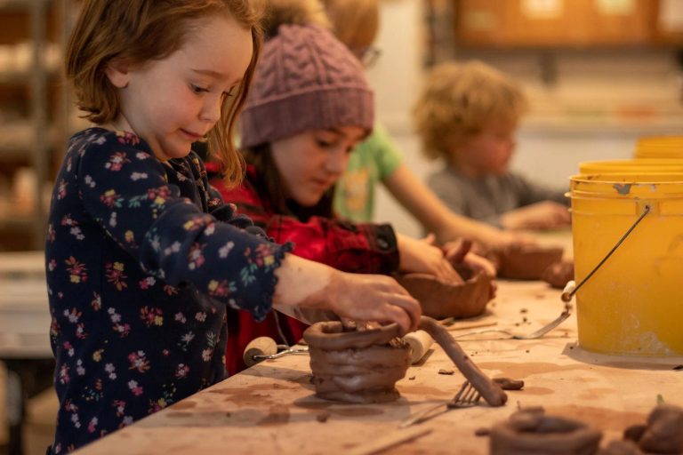 Children creating handmade pottery during hands-on learning at Providence Christian Montessori School in Alamance County, NC